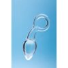 Clear Clarity Utopian Delight small glass butt plug with ring handle on a blue background