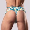 Back view of the Male Power Cut It Out thong in a blue geometric print