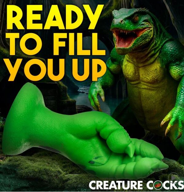 Raptor Claw fisting dildo lying on its side showing the suction cup