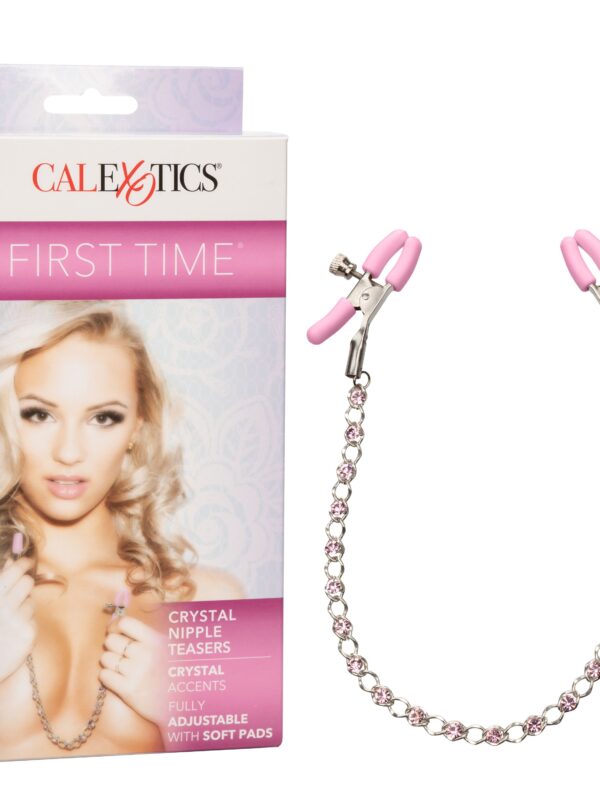 Pink crystal nipple clamps with chain beside their retail box