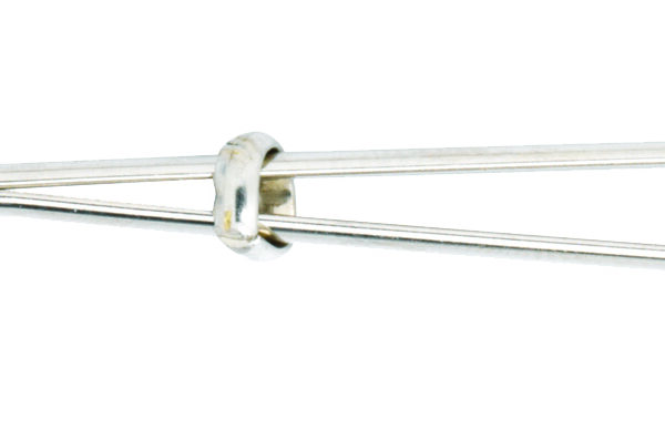 Purple beaded tweezer clit clamp shown flat with its sliding adjustment ring