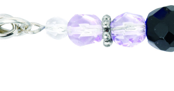 Close view of the purple and black faux crystal beads on the tweezer clit clamp