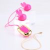 Molli pink vibrating nipple clamp necklace with bunny-ear clips and gold pendant controller