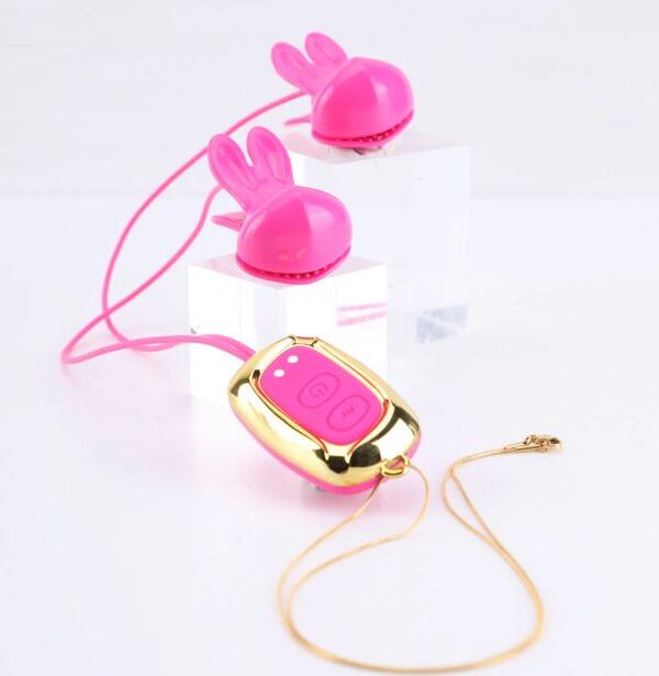 Molli pink vibrating nipple clamp necklace with bunny-ear clips and gold pendant controller