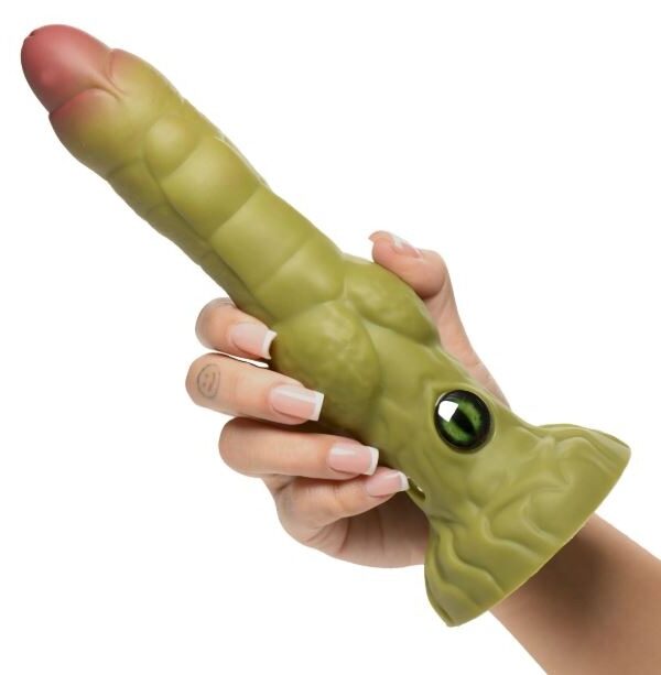Hand holding the Eyegor thrusting dildo to show its size