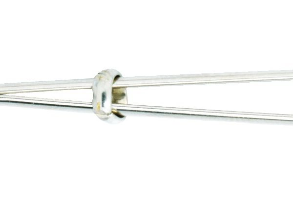 Pink beaded tweezer clit clamp shown flat with its sliding adjustment ring