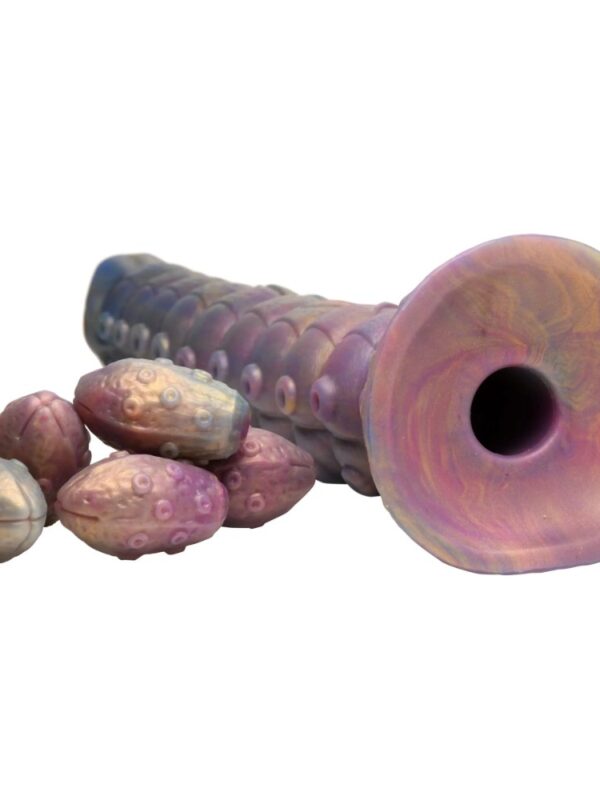 Deep Invader base showing the opening of the hollow egg tunnel beside its eggs