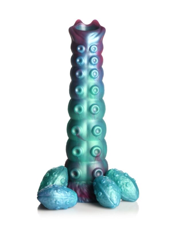 Creature Cocks Galactic Breeder alien ovipositor in iridescent teal and red with its silicone eggs