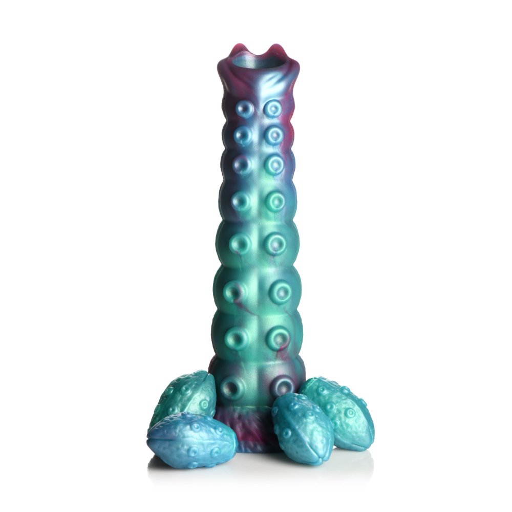 Creature Cocks Galactic Breeder alien ovipositor in iridescent teal and red with its silicone eggs