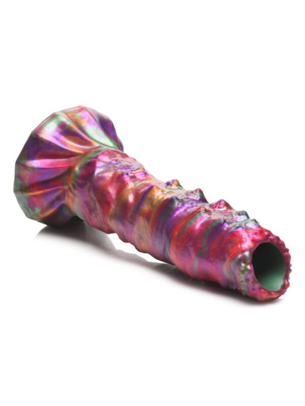 Larva ovipositor dildo on its side showing the open tip the eggs come out of