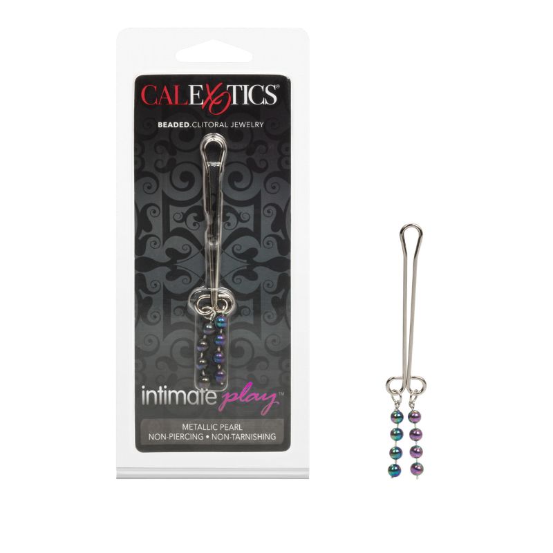 Non-piercing beaded clit clip beside its retail pack