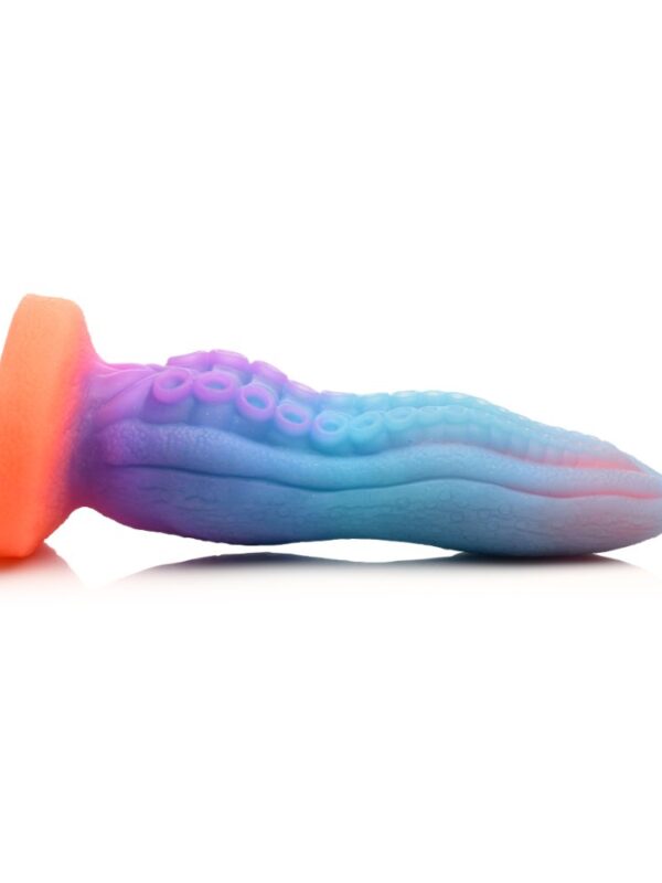 Tenta-Cock lying on its side showing the suckers, side ridges and suction cup base